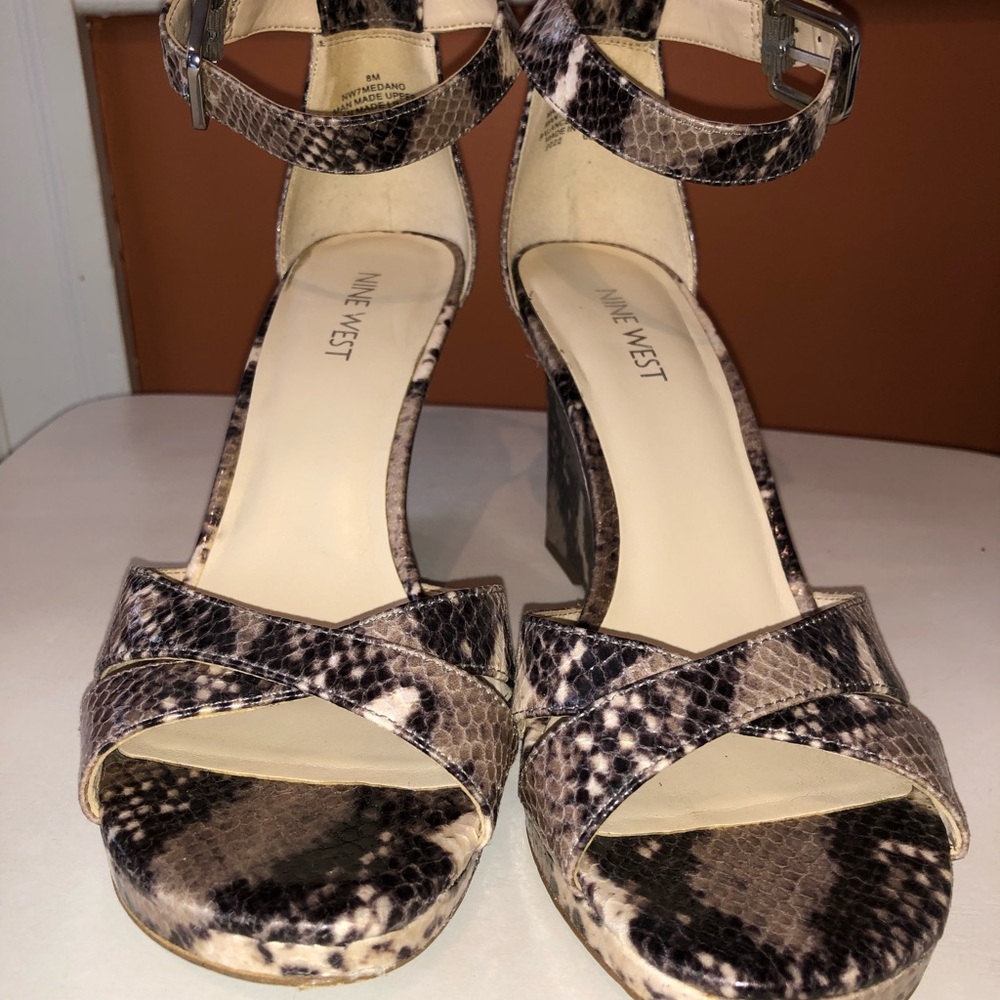 Nine West snakeskin sandals.